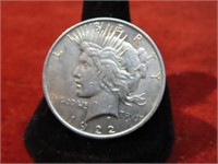 1922- 90% silver peace dollar US coin.