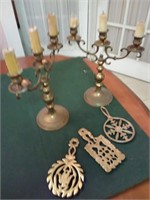 BRASS TRIVETS AND CANDLEABRA