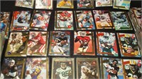 Box full of ACTION PACKED Football Cards