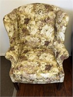 Flower designed winged back chair