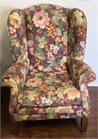 Floral wing back chair, with wooden legs
