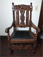 Early English carved chair w/ cherubs & an eagle.