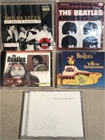 Five Beatles CD's