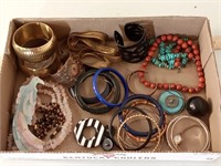 flat of various costume jewelry