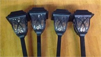 Lot of four solar lights