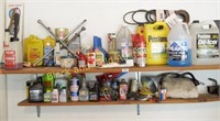 Two shelves of automotive supplies