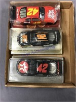 3 NASCAR model cars in display box