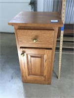 Oak single cabinet with drawer.  Great condition