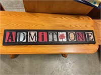 Admit, one wood sign