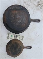 Two cast-iron skillets  10 1/2"  & #2