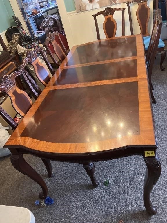 Dining room table and 2 captains 6 reg chairs,