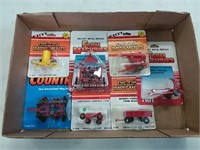 assortment of ERTL 1/64 scale implements