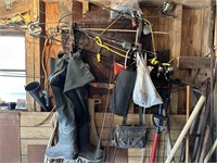 LOT OF FISHING RODS, FISHING GEAR, HIP WADERS, &