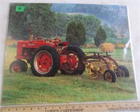 Picture of Farmall M with NH rake