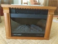 Compact Electric Fireplace by Heat Surge