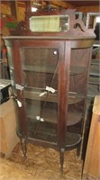 Curved front 4-tier china cabinet. 66"T x 34.5"W