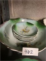 PORCELAIN FLORAL BOWL AND FIVE SAUCERS