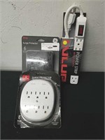 2 New 6 Outlet surge protectors and a power strip