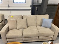 TAN UPHOLSTERED MOTORIZED RECLINING SOFA