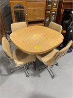 42" DINNETTE TABLE W/ 4 MATCHING ROLLING CHAIRS