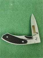 Silver and black pocket knife 3" blade
