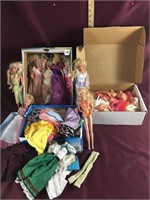 Lot of Barbies and barbie clothes