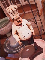 Figurine of a chef holding a skillet, 30" high
