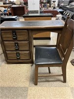 Wooden desk with chair- little water damage on