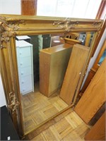 Large wall mirror with beveled glass front and