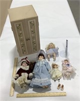 5 small porcelain dolls w/ wooden clothes holder