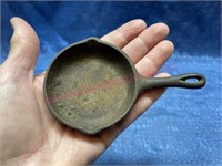 Antique cast iron toy skillet