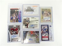 Assorted Autographed Sports Cards in Protectors