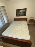Full size bed with sheet set and comforter
