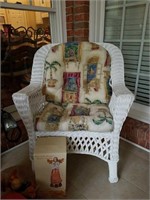 White wicker chair with cushion