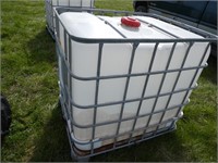 1000 L. water tote in frame