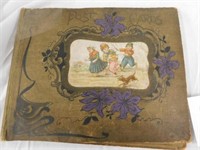 Vintage scrapbook with postcards, greeting cards,