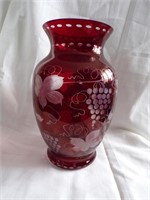 RED VASE WITH RAISED DESIGN, GRAPE LEAVES