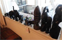 Selection of hand carved African figurines and