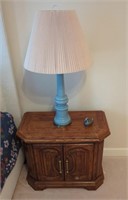 Oak end table and blue lamp