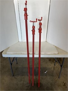 3 red pipe clamps