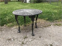 Cast metal patio side table