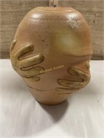 Funny glazed clay pot