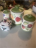 Ceramic canisters -,one has a chip