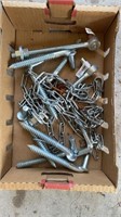 tray lot of anchoring bolts, and some chain,