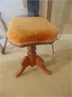Piano stool with upholstered seat