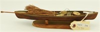 Lot #216 - Miniature hand carved pirogue boat