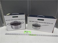 Dutch oven with lid and sauce pan with lid; both N