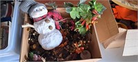 Box of miscellaneous holiday decor and garlands