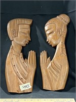 Wooden carved couple