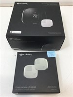 Ecobee room sensors and wifi thermostat. In box.